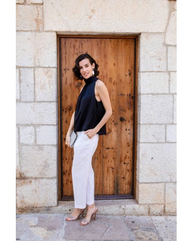 Pantalón de lino blanco de diseño sostenible Arturo Coronel